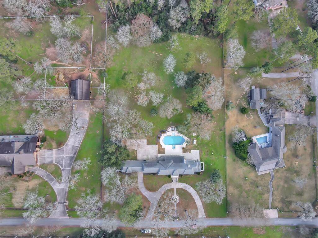 This aerial view gives you an idea about just how large the cleared space is. Wouldn't take much to have your horses boarded in your back yard.