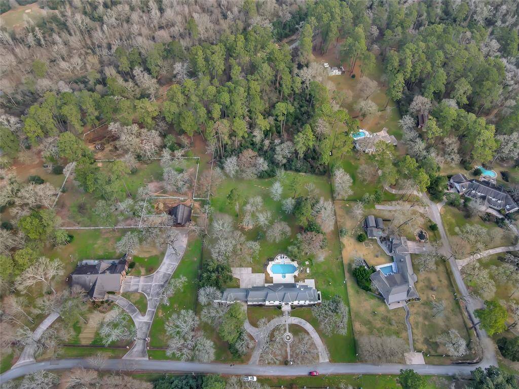 5+ acre going all the way back to the small creek past the wooded area.