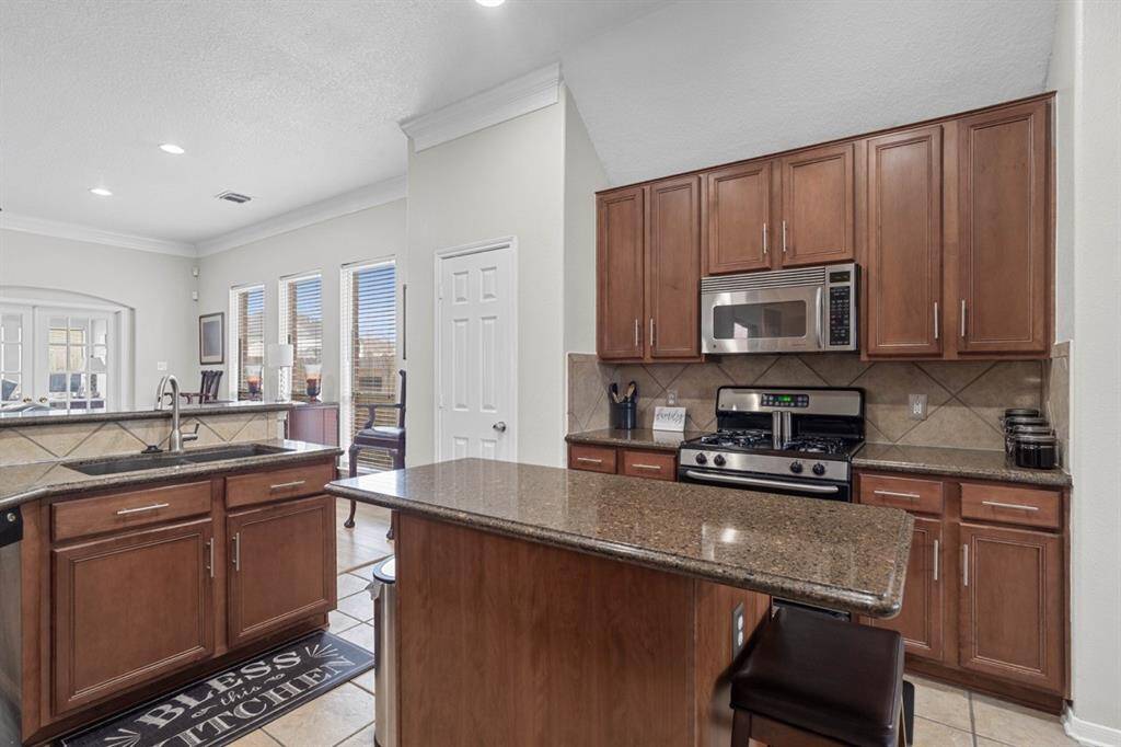 Celestine Quartz countertops in kitchen and bathrooms