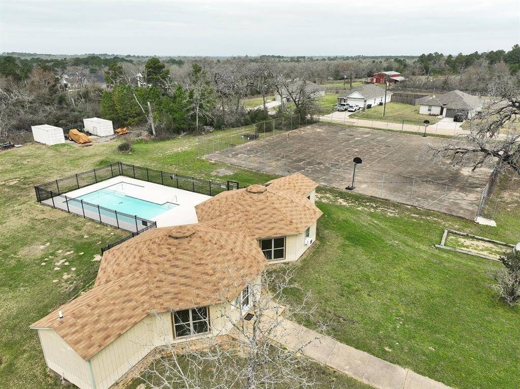 The club house, pool and basketball court.