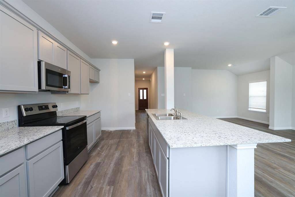 With plenty of counterspace the home chef will delight in meal prep and baking. Imagine holiday baking with room to roll out doughs and cookies.
