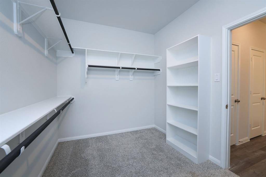 Bonus storage comes in the form of built-in shelving.