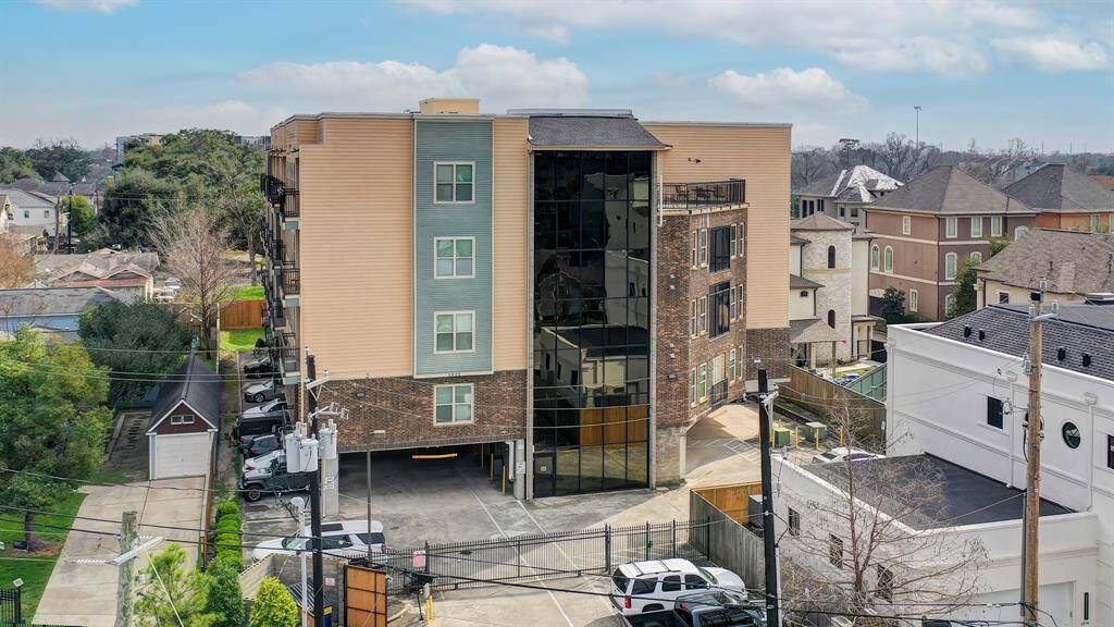 Exterior of the building is gated with ample visitor parking outside and inside the gate.