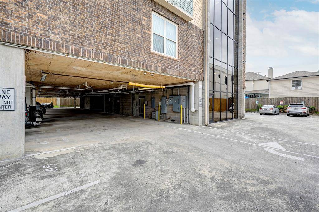 garage and gated parking. This unit has 2 reserved spots next tothis covered entrance to building area.