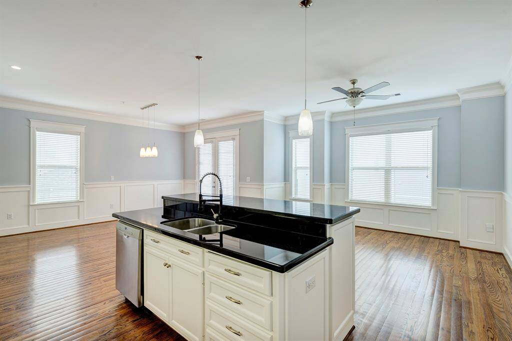 Dining shown with virtually staged round table. Owner had a rectangular one.