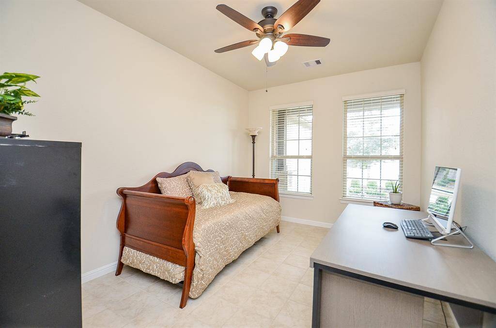For those who work from home or enjoy hobbies, a private office behind elegant French doors provides a serene and productive retreat.