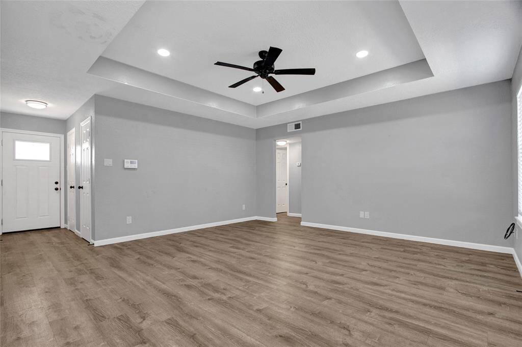 Welcome home!  Step in your front door to a spacious sanctuary!  The living area is open and airy with beautiful coffered ceiling and recessed lighting.