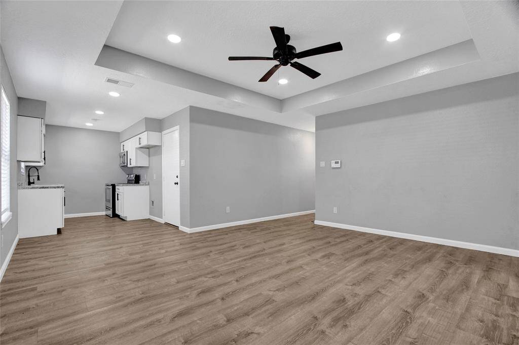 The dining area and the kitchen are conveniently open to the living area.  The laundry is in the garage and comes equipped with a washer and dryer!