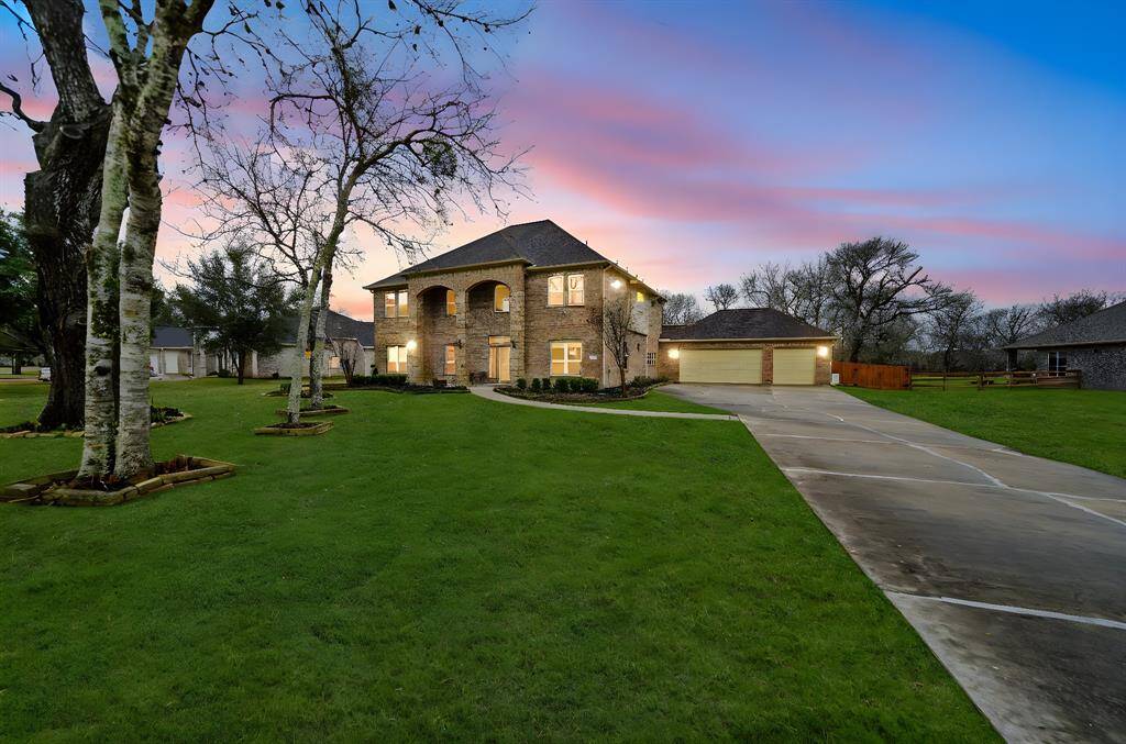 Welcome to 32603 Westminster Drive, a stunning home in the Weston Lakes community of Fulshear, TX. This gated golf course community offers resort-style living with a private Country Club, scenic views.