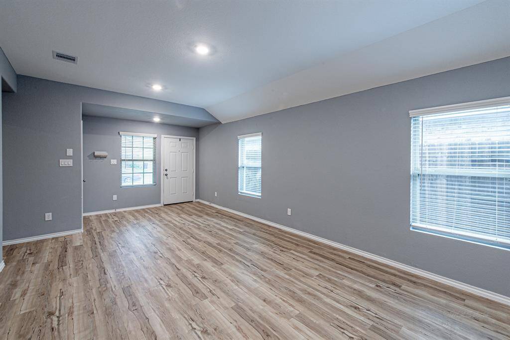Neutral paint throughtout main area, recessed lighting, and plenty of natural light.