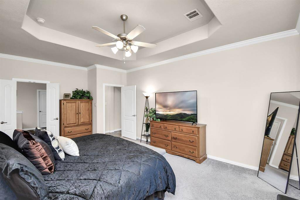 With this home being a retreat away from the chaos of the city, then the Master Bedroom is your sanctuary. The bay window option was selected when building giving you a wonderful little nook for a reading area or a lounger. It allows for plenty of natural light during the day with a wonderful view of the backyard and the greenspace behind the home.