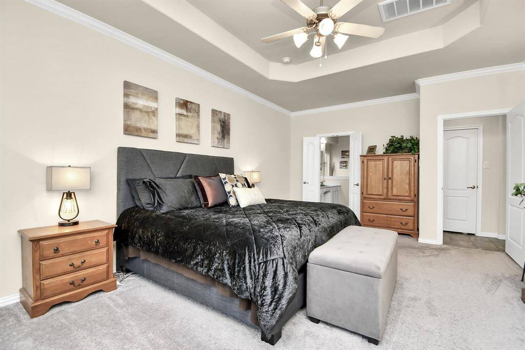 With this home being a retreat away from the chaos of the city, then the Master Bedroom is your sanctuary. The bay window option was selected when building giving you a wonderful little nook for a reading area or a lounger. It allows for plenty of natural light during the day with a wonderful view of the backyard and the greenspace behind the home.