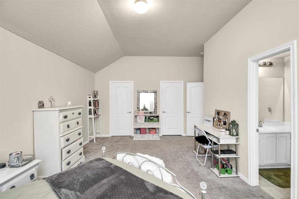 Another one of the secondary bedrooms. It is one of the two bedrooms connected to the Hollywood-style bathroom.