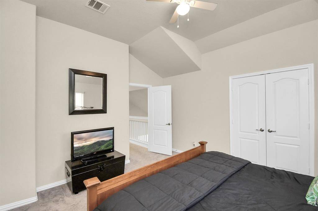 This is the fourth bedroom in the home. It is also connected to the Hollywood-style bathroom.