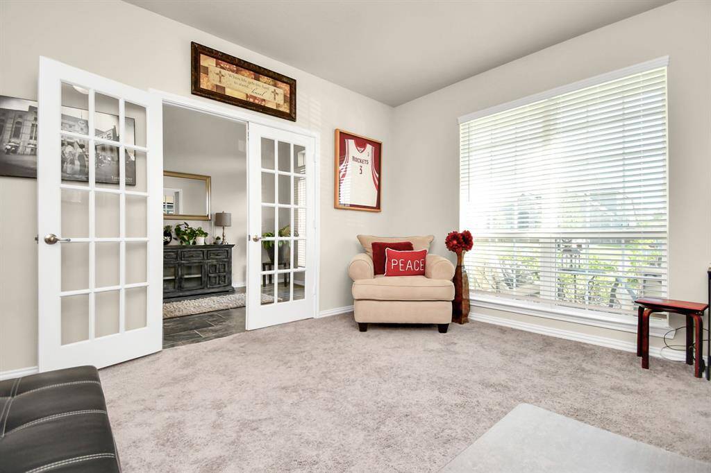 Behind the french doors at the front of the house you will find this study/home office area. The floor is carpeted which is perfect to eliminate echos during video conference calls. The great thing about this space is that if you decided you didn't need a home office it could easily be used as a formal living room or an additional downstairs play area with a soft place to crawl or fall for those younger ones you may not be steady on their feet yet.