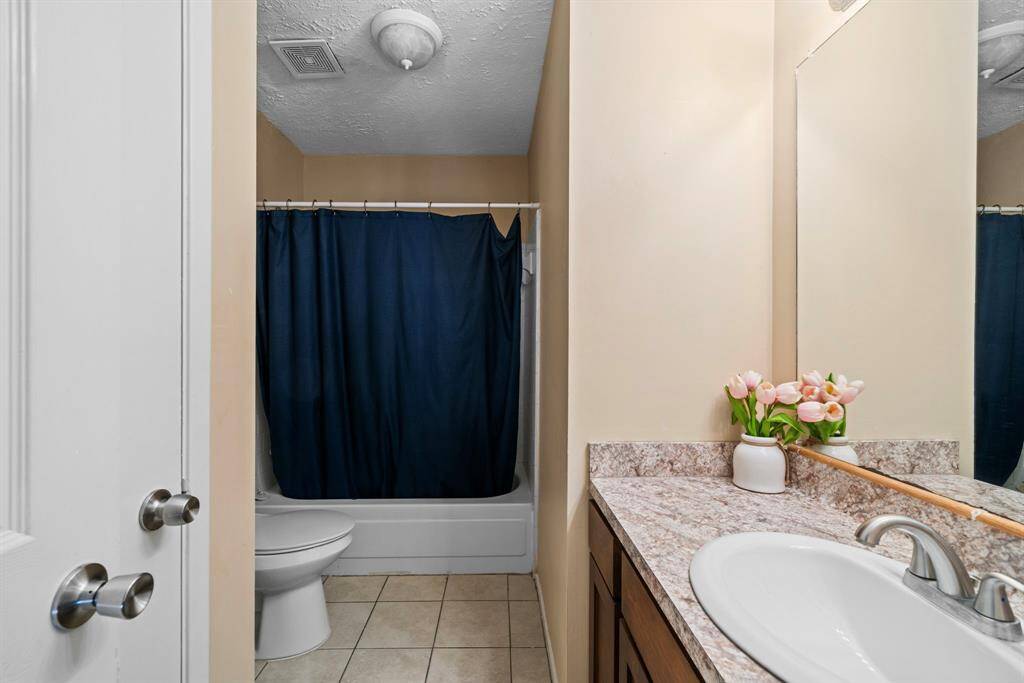 Well appointed hall bath.