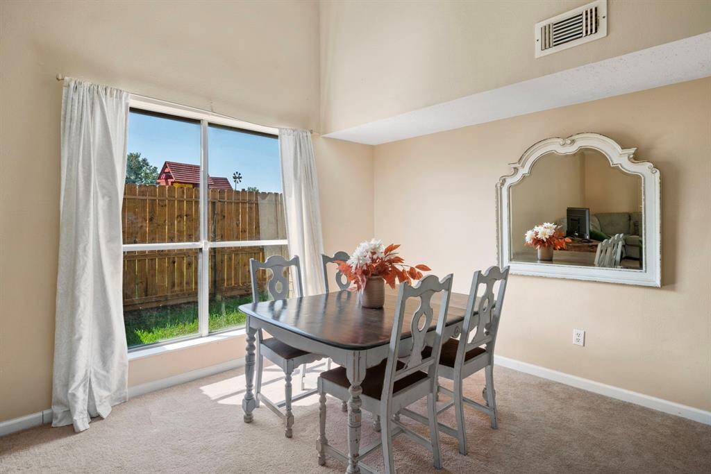 Large picture windows flank the walls of this oversized space