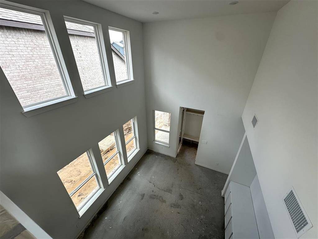 From top to bottom, this two-story home is bathed in natural light, creating a welcoming atmosphere throughout