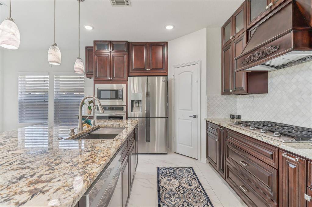 Master bedroom bright, spacious room features rich hardwood floors, large windows
