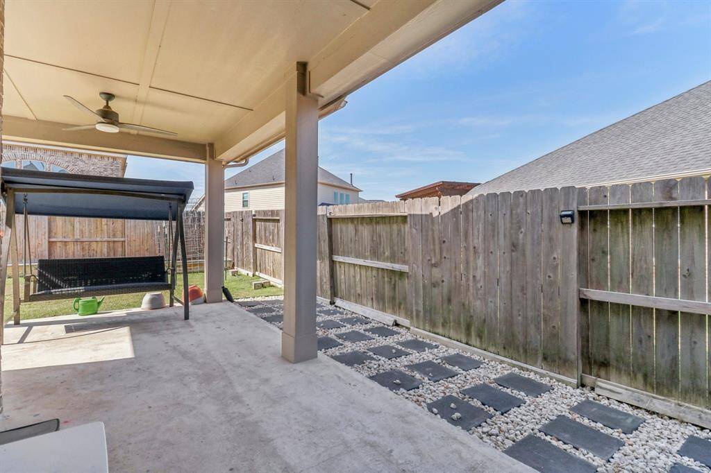 Extra slab in backyard offering a perfect space for outdoor activities and relaxation.