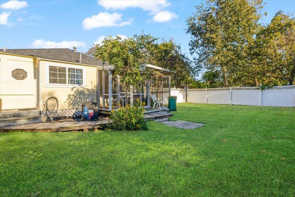 Fenced in back yard for main residence