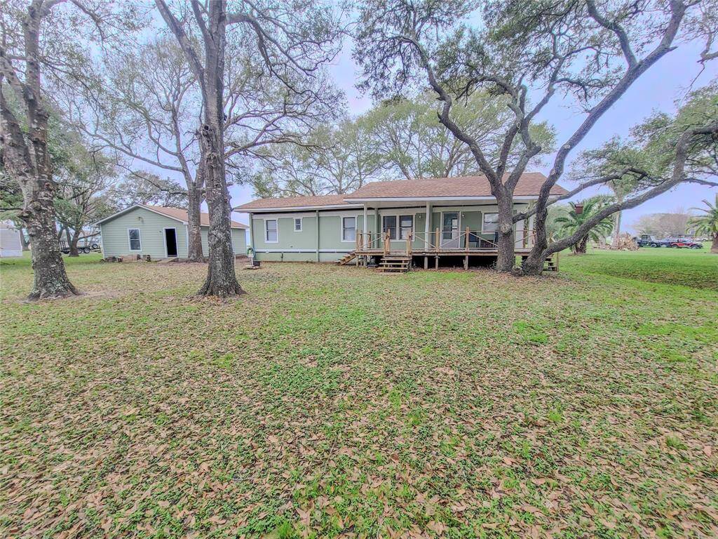 View of back of house and yard