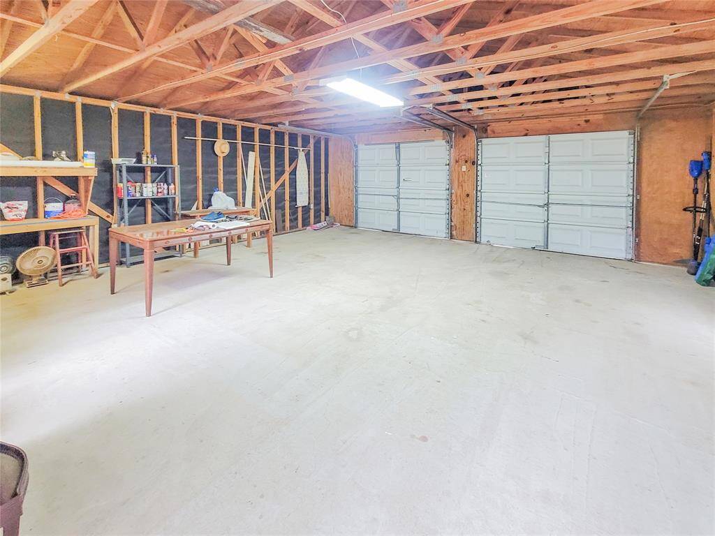 Spacious garage with new roof