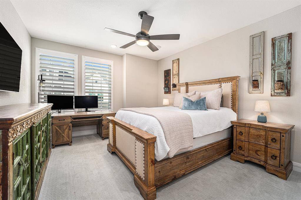 Charming upstairs second bedroom, ideal for guests or a personal retreat, offering plenty of space and natural light to create a comfortable and inviting atmosphere.