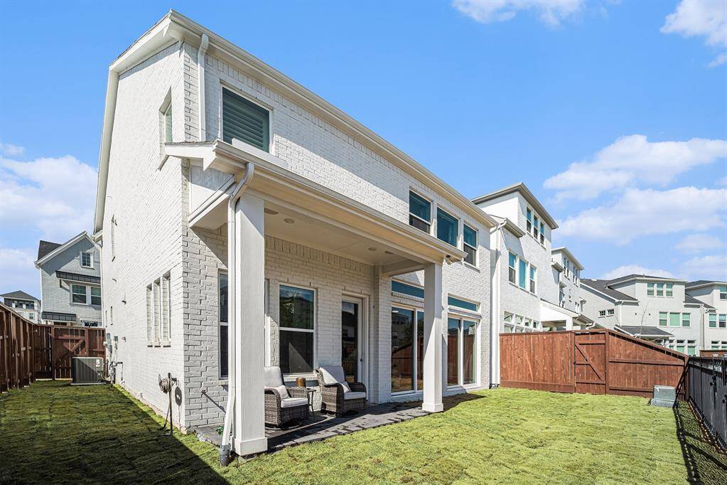 Enjoy the best of outdoor living in this spacious backyard, featuring a durable covered metal roof and a built-in speaker system, creating the perfect setting for gatherings, relaxation, and year-round enjoyment.