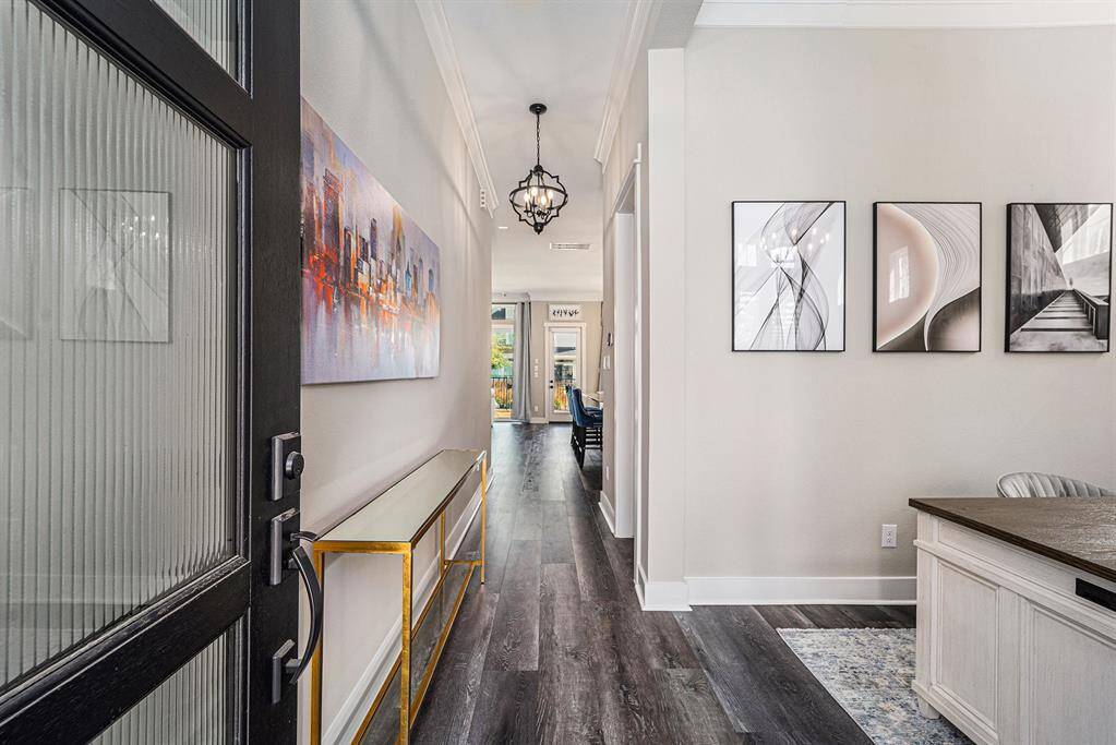 Inviting entryway to this custom-built home, where every inch has been thoughtfully designed, setting the tone for the exceptional attention to detail throughout.