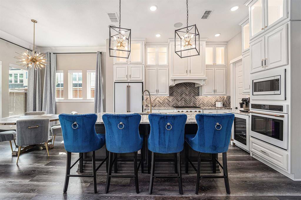 Stunning kitchen filled with natural light, creating a warm and inviting space perfect for cooking and gathering.