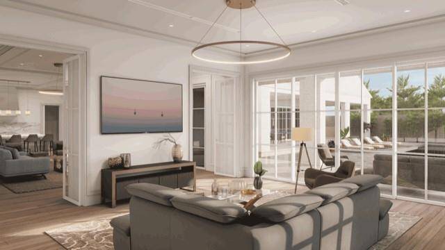 Rendering of family room. Another very nice living area with sliding doors to the back porch that wraps the rear of the home.