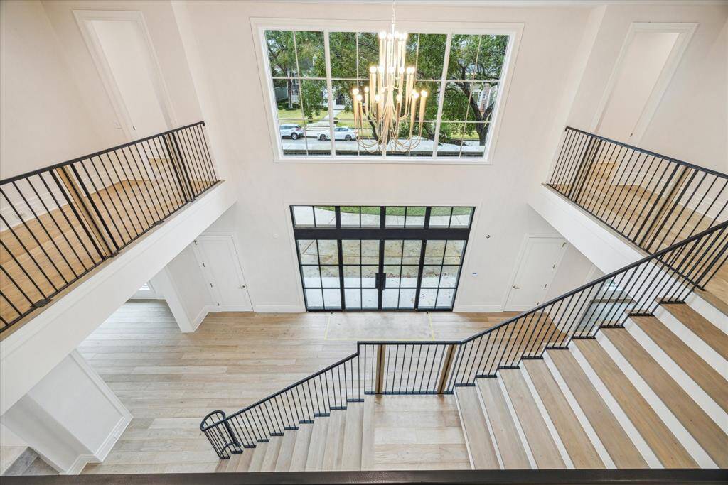 Second floor landing view towards front door and entry