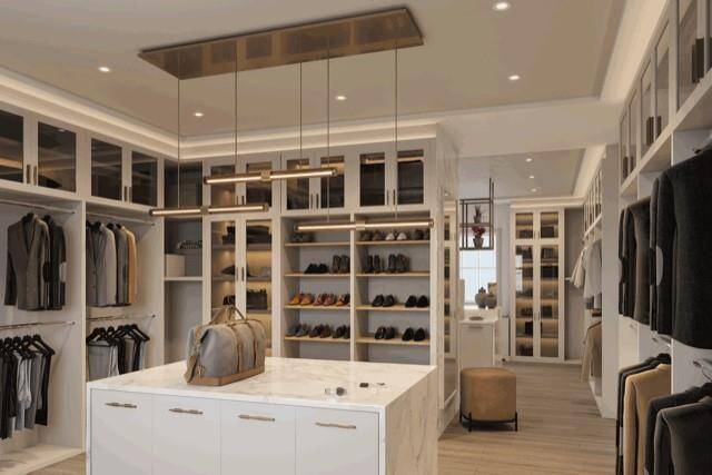 Rendering of one of two primary closets. Tremendous walk in closets with natural light and great storage.