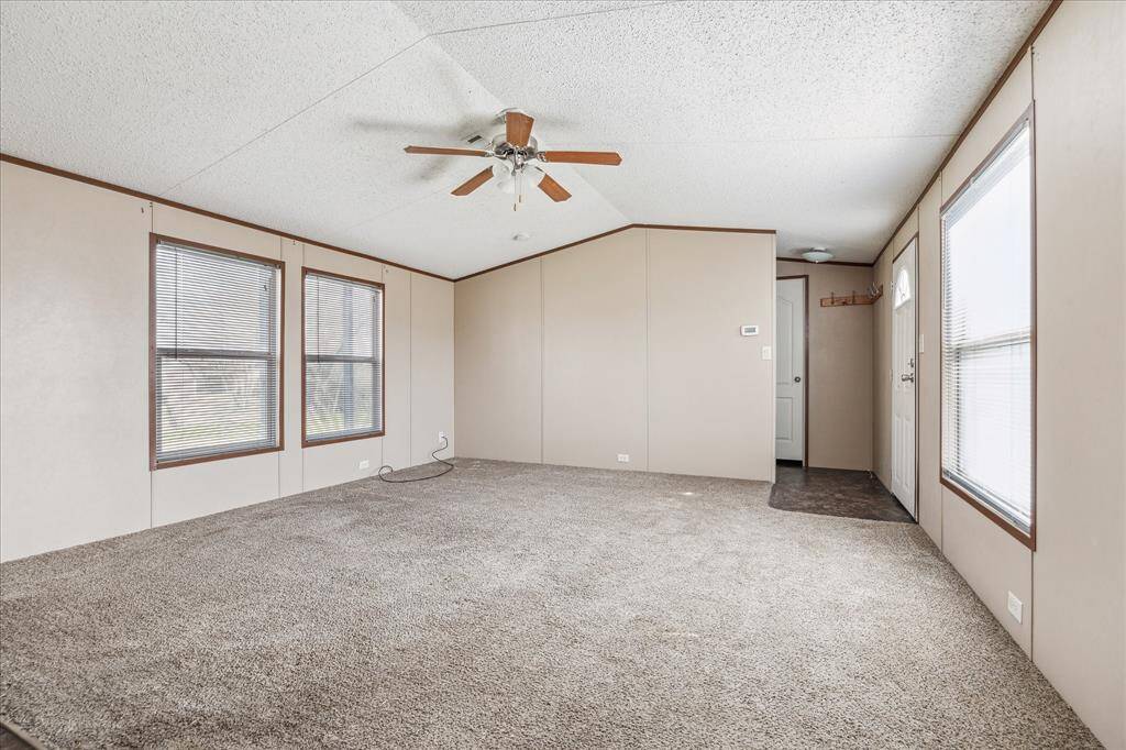 Living room space facing the secondary bedroom door