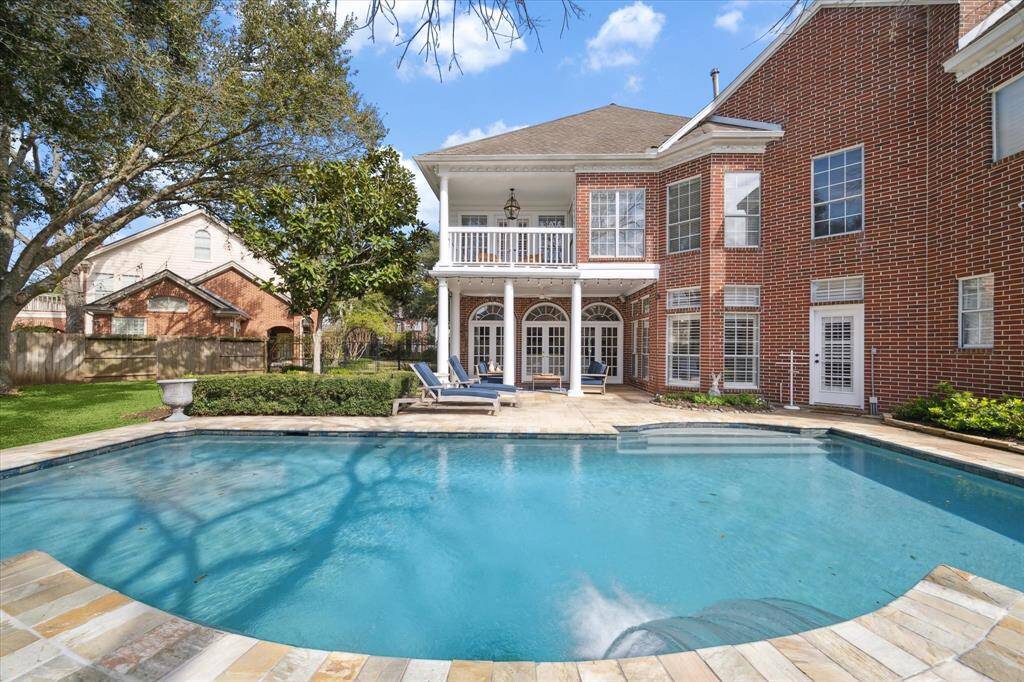 Look at this gorgeous pool and home.  The entire pool are was recently refurbished. Fresh!!!