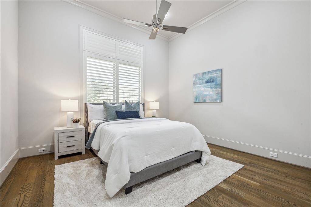 GUEST SUITE [1ST FLR]: The spacious first-floor guest suite offers the perfect blend of comfort and privacy.  Ideal for guests or multigenerational living, this inviting retreat provides convenience and luxury with easy access to the home's main living areas.