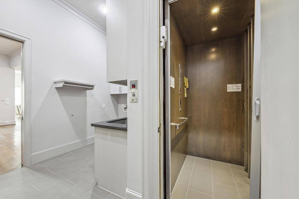 ELEVATOR: Convenience meets luxury with the elevator that seamlessly travels from the garage to the first and second floors. Offering effortless access to all levels of the home, this sophisticated feature ensures ultimate ease of movement, whether you're bringing in groceries, moving between floors, or simply enjoying the added comfort.