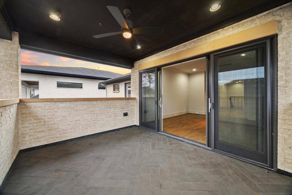 BALCONY: Step outside the game room onto a private covered balcony, the perfect retreat for relaxing and unwinding.