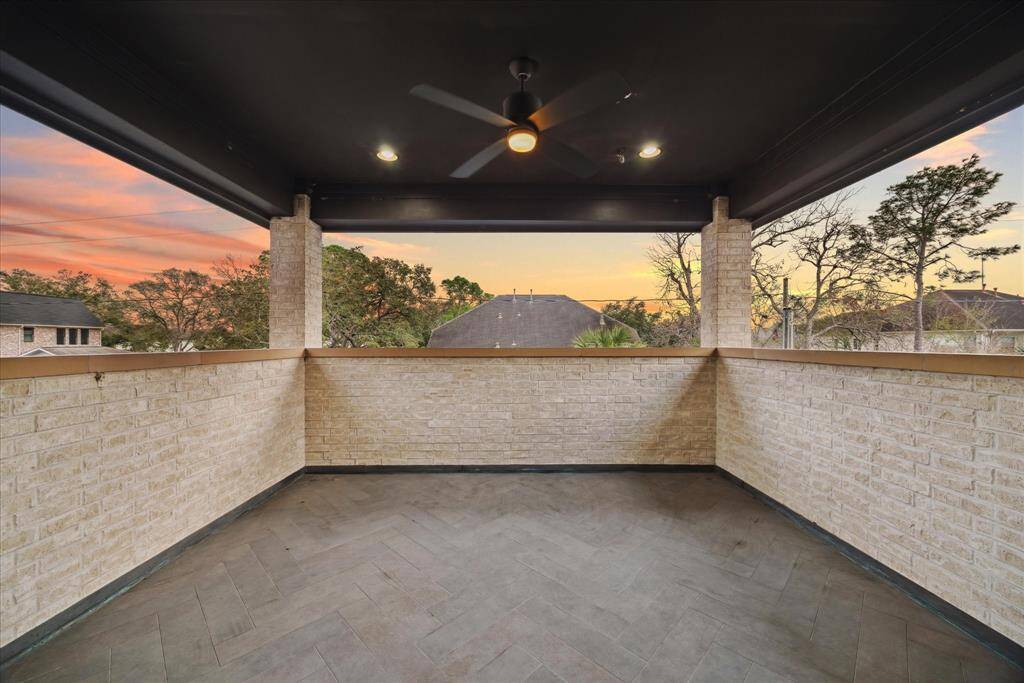 This serene outdoor space offers a seamless extension of the entertainment area, ideal for enjoying morning coffee, evening breezes, or simply taking in the view. With its covered design, it provides year-round enjoyment in a peaceful and private setting.