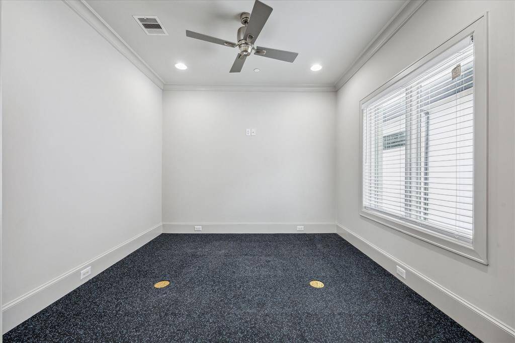 GYM: This private home gym offers the perfect space for health and wellness right at home. Thoughtfully designed for functionality and comfort, it features ample space for equipment, durable flooring, and bright lighting to create an energizing workout environment.