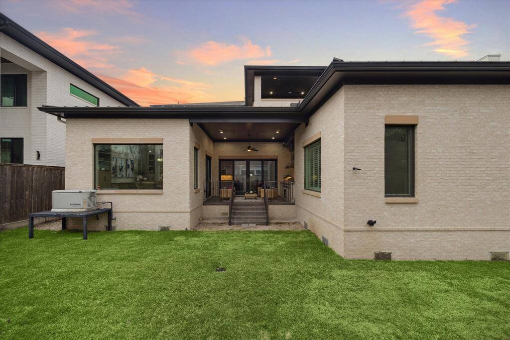 BACKYARD W/GENERATOR: This expansive backyard offers both beauty and peace of mind, featuring lush green space and a WHOLE HOME GENERATOR for uninterrupted comfort. Whether entertaining, relaxing, or enjoying outdoor activities, this well-appointed yard ensures year-round enjoyment with added reliability during any season.