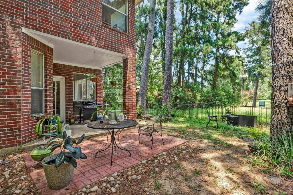 Secluded patio retreat with house provides shade.  Perfect for outdoor relaxation and entertainment.
