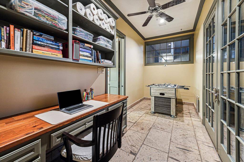 Home office is located in the back of the house and could also be a game room.