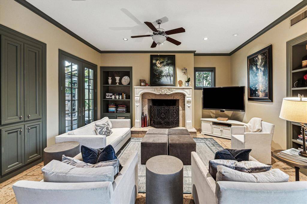 Family room also accesses the covered patio through French Doors at left.