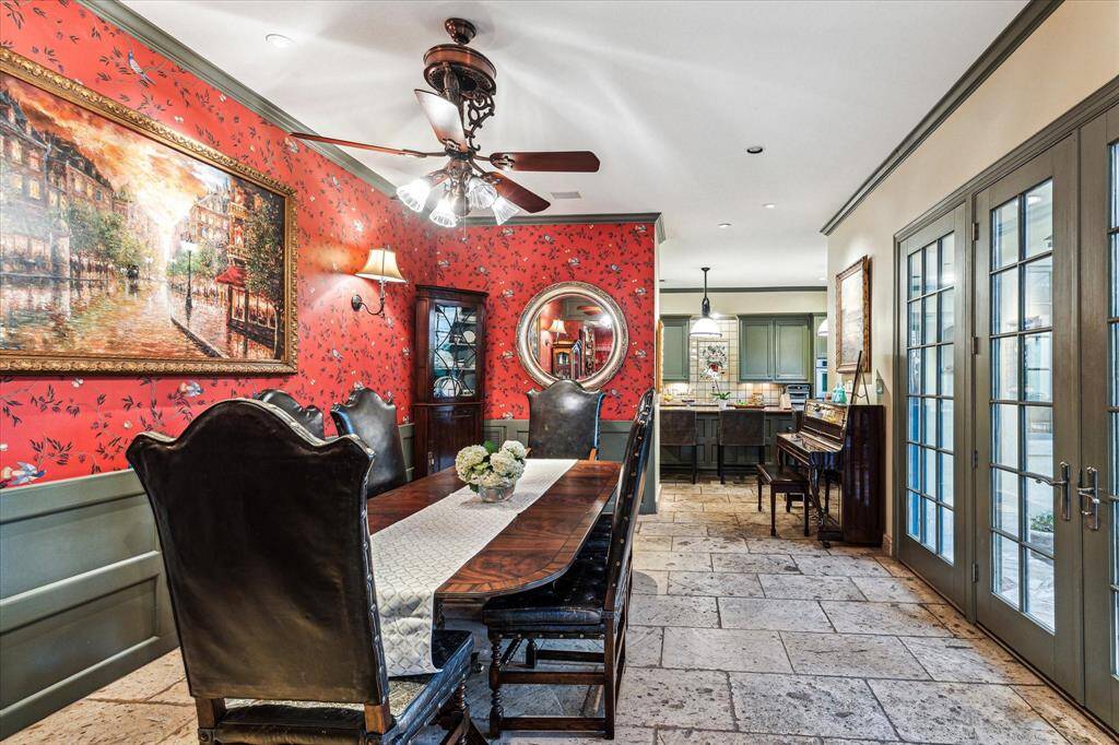 Formal living room is located between the kitchen and family room.