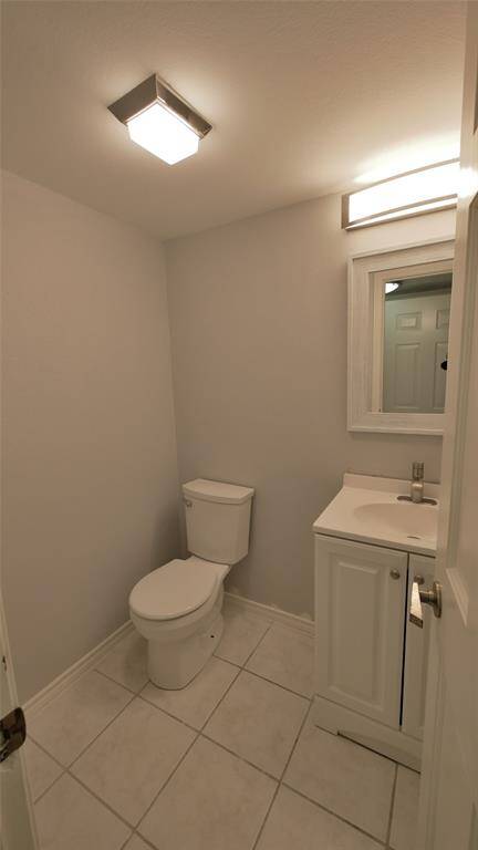 1/2 BATH OFF THE KITCHEN