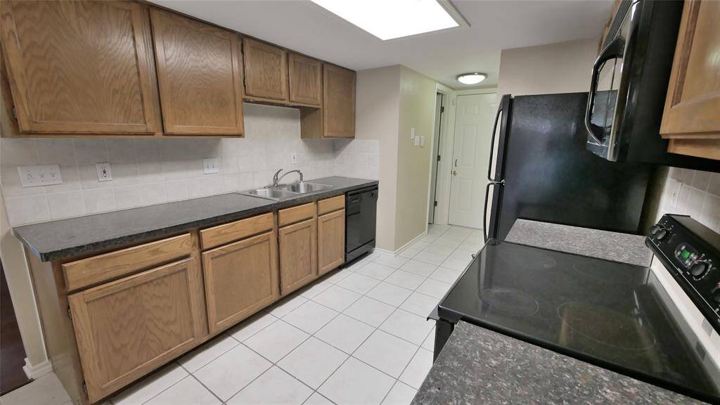 ANOTHER VIEW OF THE KITCHEN