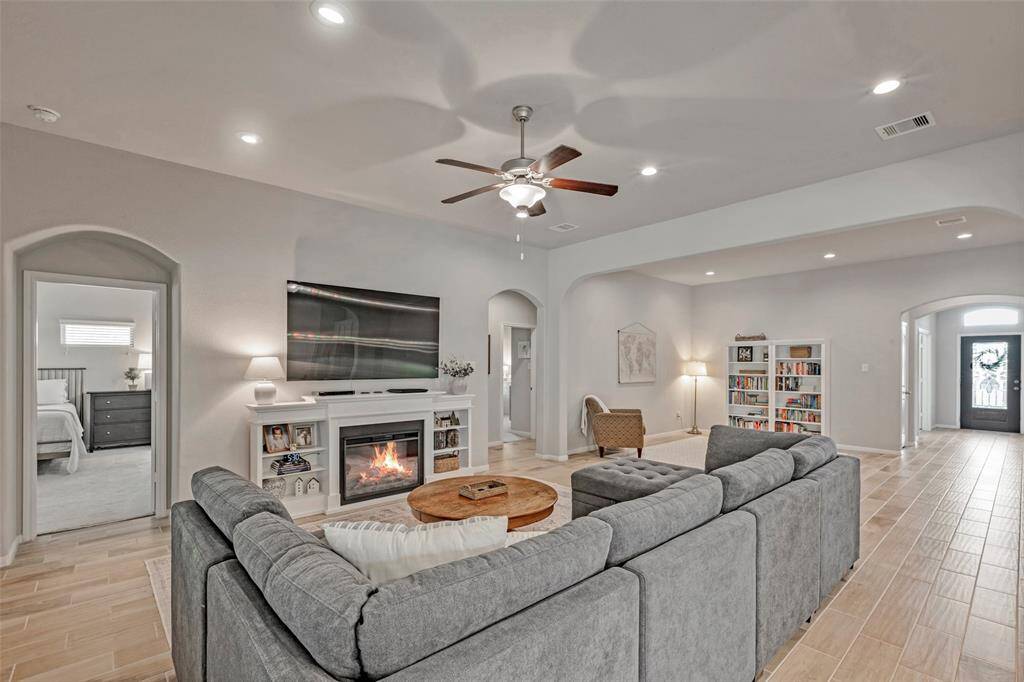 Tile flooring in all areas except the bedrooms and study.
