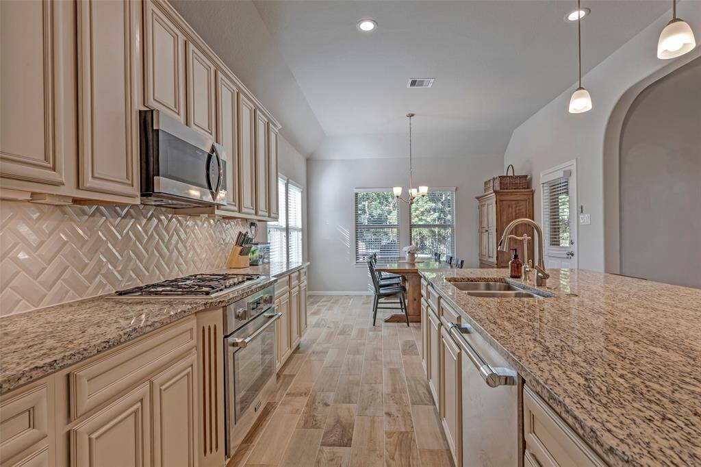 The appliances have been updated as well. The gas range is Thermador with wifi.